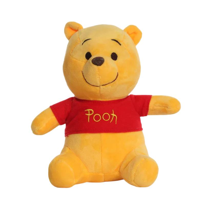 Encante-se com o Peluche Ursinho Pooh de 23cm, inspirado no clássico Winnie the Pooh. Seguro (Certificado CE), macio e ideal para crianças com mais de 3 anos. Perfeito para fãs de peluches Disney!