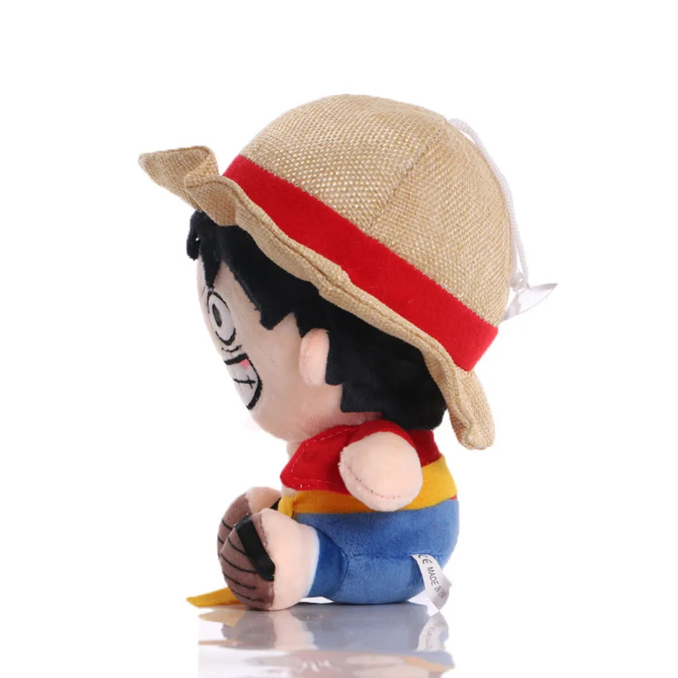 Peluche Luffy One Piece 20cm - Peluches de Anime na Plushie Descubra o Peluche Luffy One Piece 20cm, inspirado no icónico Monkey D. Luffy. Fabricado com materiais de qualidade, é perfeito para fãs de anime e crianças. Encontre já na Plushie!