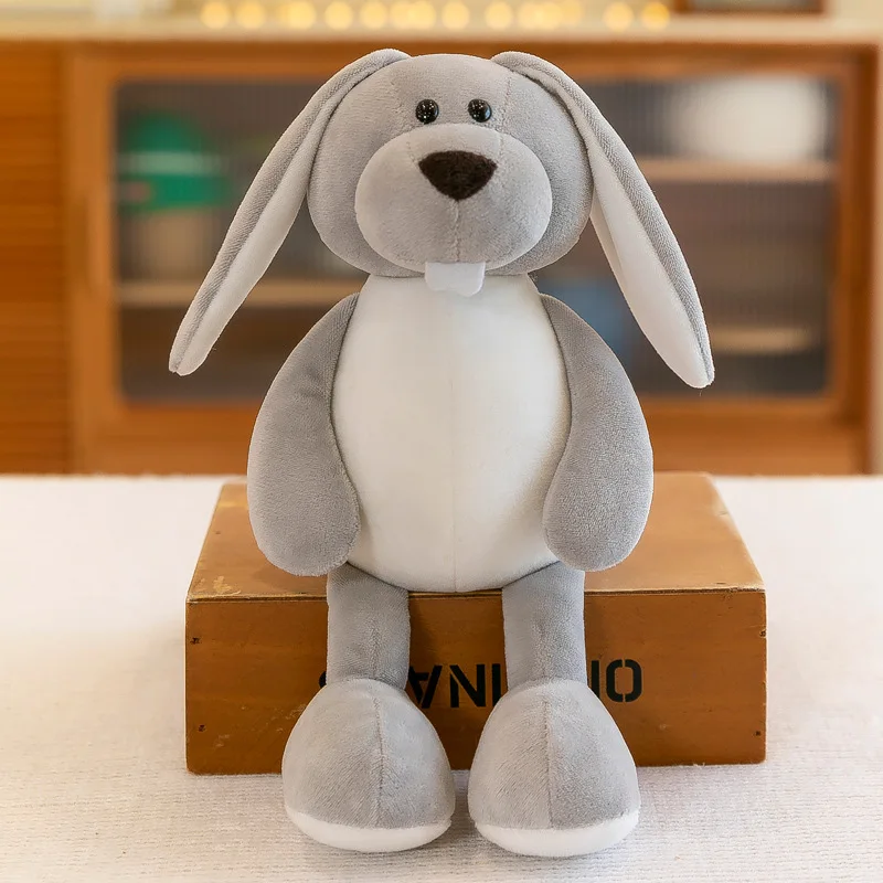 Peluche Coelho Cinzento 28cm - Peluches de Coelhos e Roedores Descubra o Peluche Coelho Cinzento 28cm, um adorável brinquedo infantil feito de materiais suaves e seguros. Perfeito para crianças a partir de 3 anos. Qualidade e conforto garantidos!