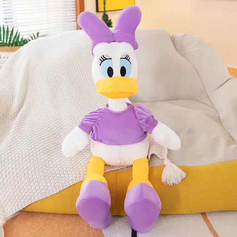 Peluche da Margarida Descobre o adorável Peluche Margarida da Disney! Com detalhes encantadores e toque macio, é perfeito para crianças a partir dos 3 anos. Disponível em 30cm e 40cm. Compra já!