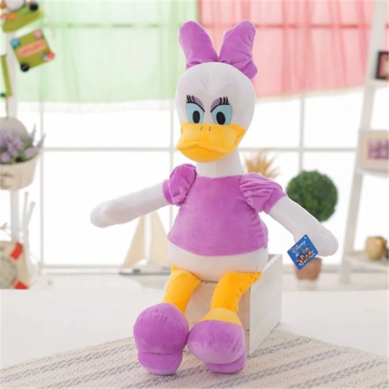 Peluche Margarida - Disney - Macio, Fofo e Perfeito para Abraços Descobre o adorável Peluche Margarida da Disney! Com detalhes encantadores e toque macio, é perfeito para crianças a partir dos 3 anos. Disponível em 30cm e 40cm. Compra já!