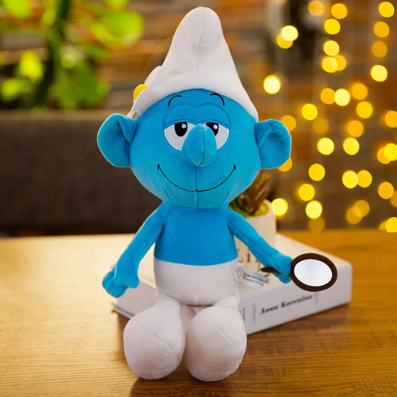 Peluche Smurf Vaidoso 40cm - Peluche Infantil dos Smurfs Adiciona glamour e diversão à tua coleção com o Peluche Smurf Vaidoso de 40cm! Feito com materiais suaves e seguro para crianças +3 anos. Compra já o teu Smurf Vaidoso!