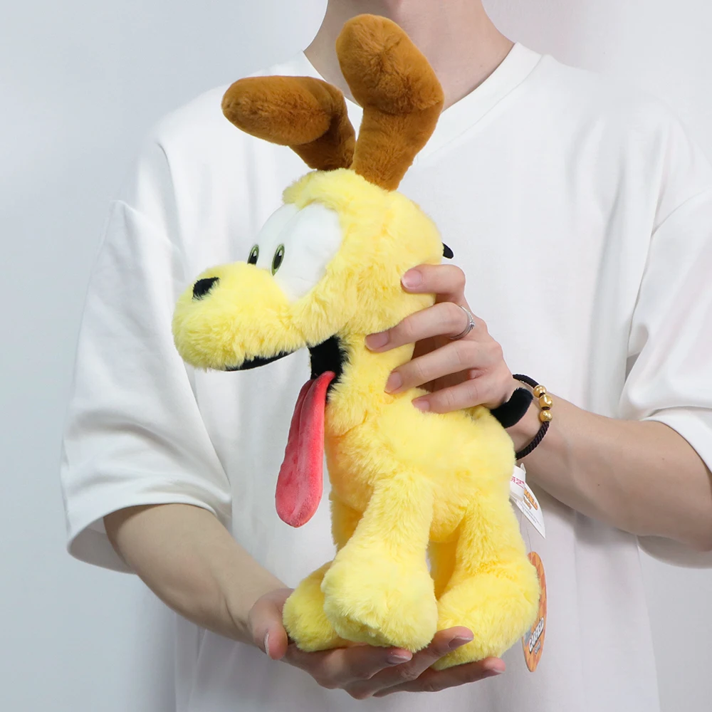 Peluche Odie - Garfield 25cm - O Amigo Leal e Divertido do Garfield Descobre o Peluche Odie - Garfield 25cm, o cão fiel e brincalhão do Garfield. Suave, de alta qualidade e certificado CE, é perfeito para fãs de todas as idades. Compra já!