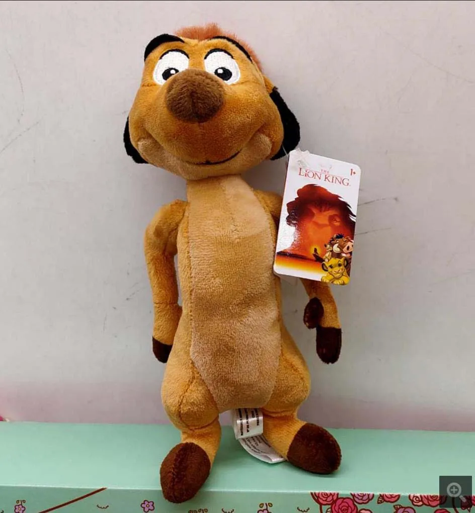 Peluche Timon 22cm - Bonecos de Peluche do Rei Leão Descobre o Peluche Timon 22cm, inspirado no clássico O Rei Leão. Um peluche infantil divertido, macio e ideal para fãs dos filmes Disney.
