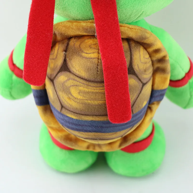 Peluche Rafael - Tartarugas Ninja 22cm - Peluche Infantil de Aventura O Peluche Rafael – Tartarugas Ninja 22cm traz toda a energia e coragem do herói rebelde da equipa. Macio, seguro e cheio de detalhes, é ideal para crianças e fãs dos filmes de aventura e fantasia.