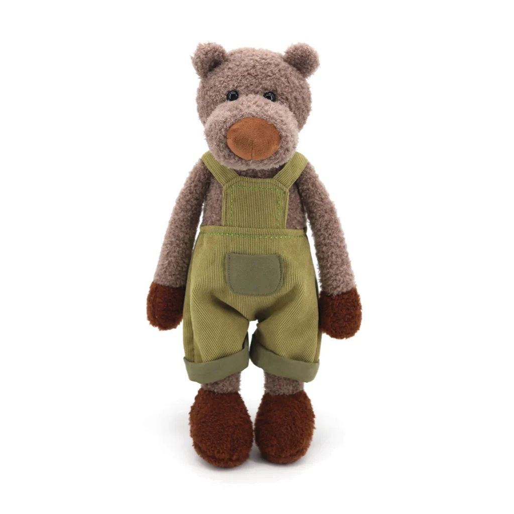 Descubra a Peluche Urso com Macacão 40cm, um peluche infantil macio e adorável. Um simpático urso vestido com macacão, perfeito para brincar, decorar ou oferecer. Certificado CE.