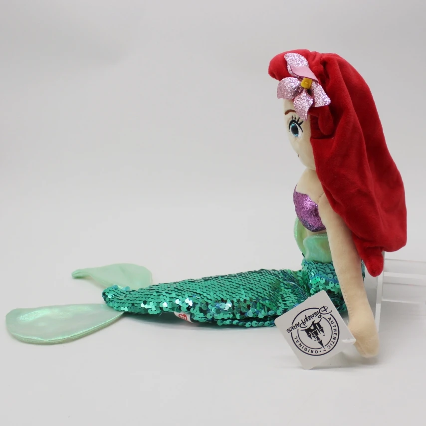 Peluche Ariel - A Pequena Sereia 40cm - Peluche Disney Macio e Encantador Descobre o mágico Peluche Ariel - A Pequena Sereia 40cm! Um peluche Disney macio, detalhado e perfeito para fãs da Ariel. Ideal para abraçar, decorar ou oferecer. Encomenda já!