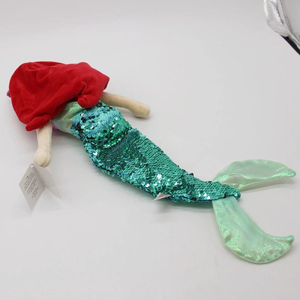 Peluche Ariel - A Pequena Sereia 40cm - Peluche Disney Macio e Encantador Descobre o mágico Peluche Ariel - A Pequena Sereia 40cm! Um peluche Disney macio, detalhado e perfeito para fãs da Ariel. Ideal para abraçar, decorar ou oferecer. Encomenda já!